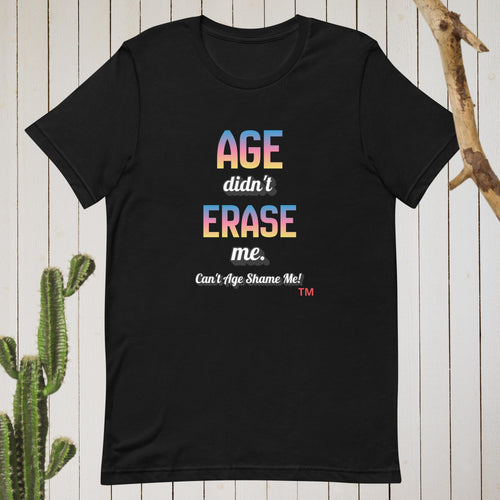 Black t-shirt with colorful text on a wooden background