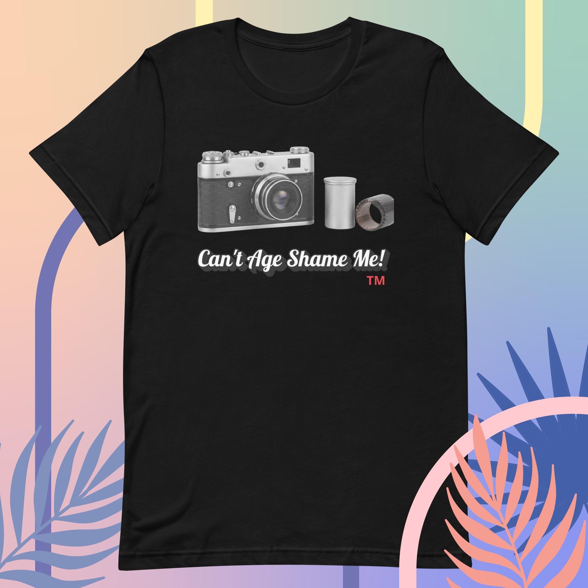 black  t-shirt with a camera graphic and text  Can't Age Shame Me! on a colorful background
