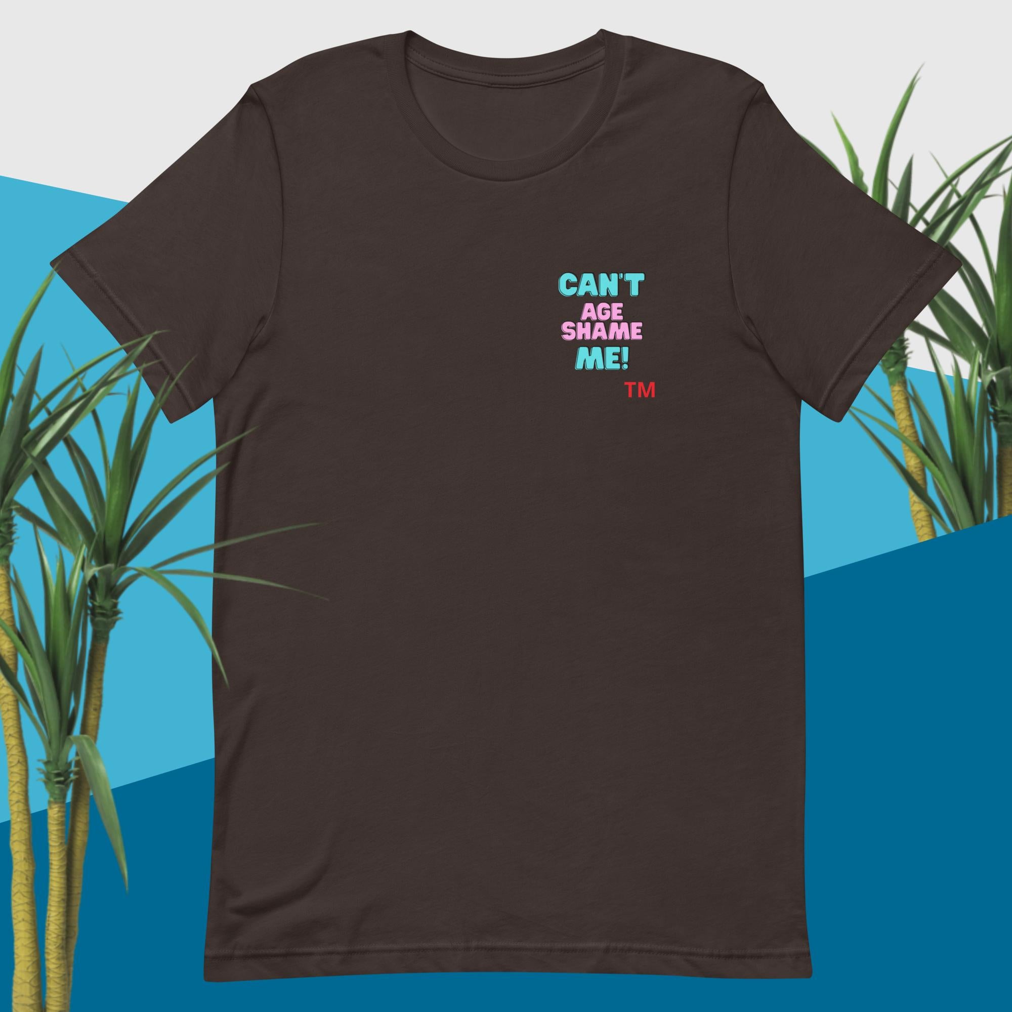 Brown t-shirt with colorful text “'Can't Age Shame Me” on a yellow background design with cactus
