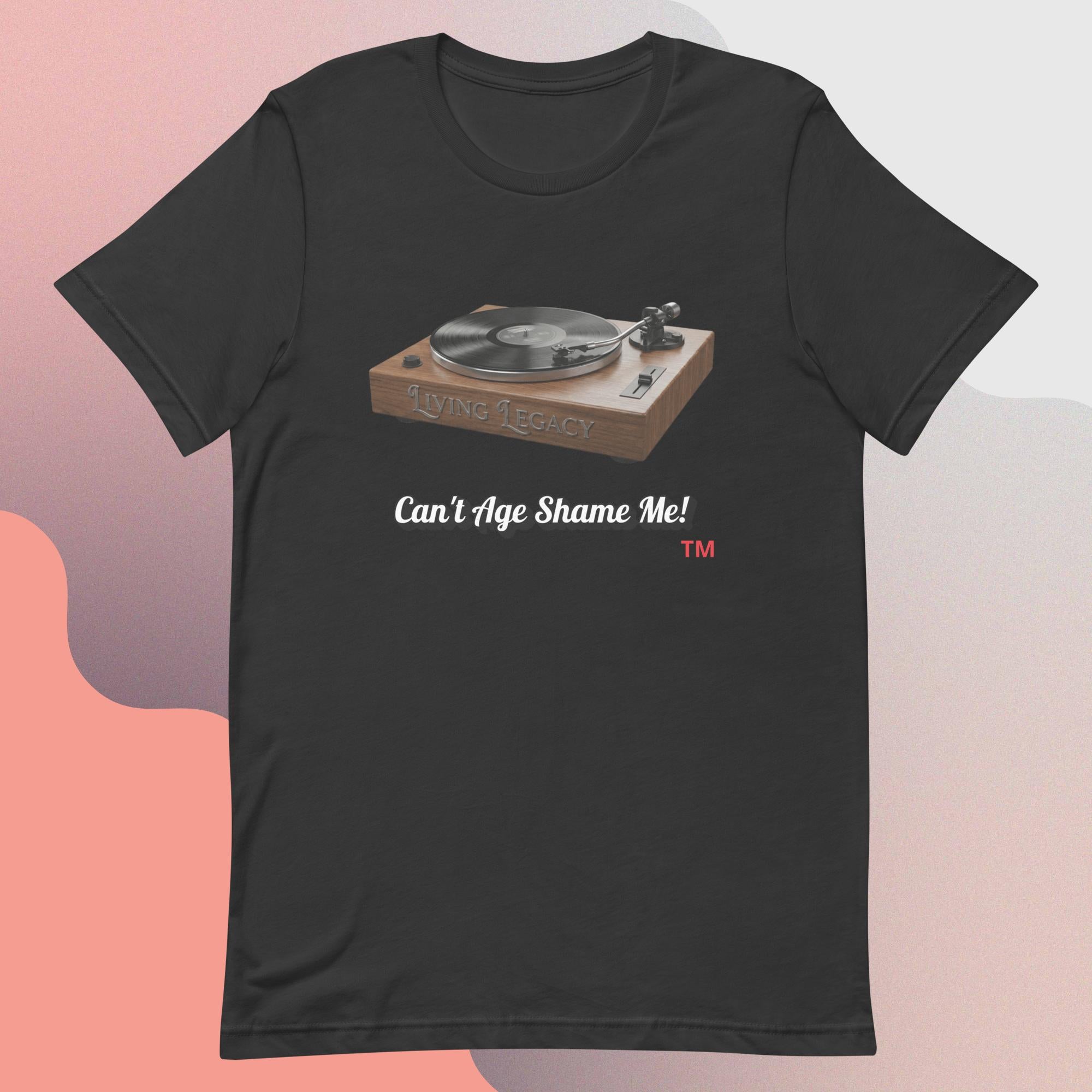 dark gray t-shirt with a graphic of a turntable and text 'Can't Age Shame Me!' on a gradient background.