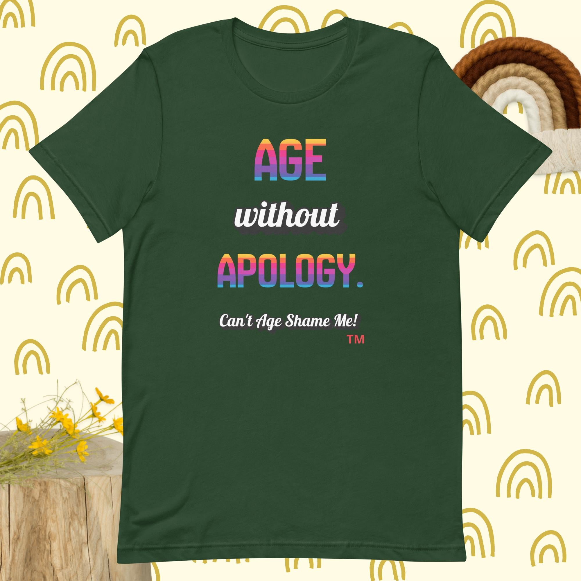 Green t-shirt with colorful text on a patterned background