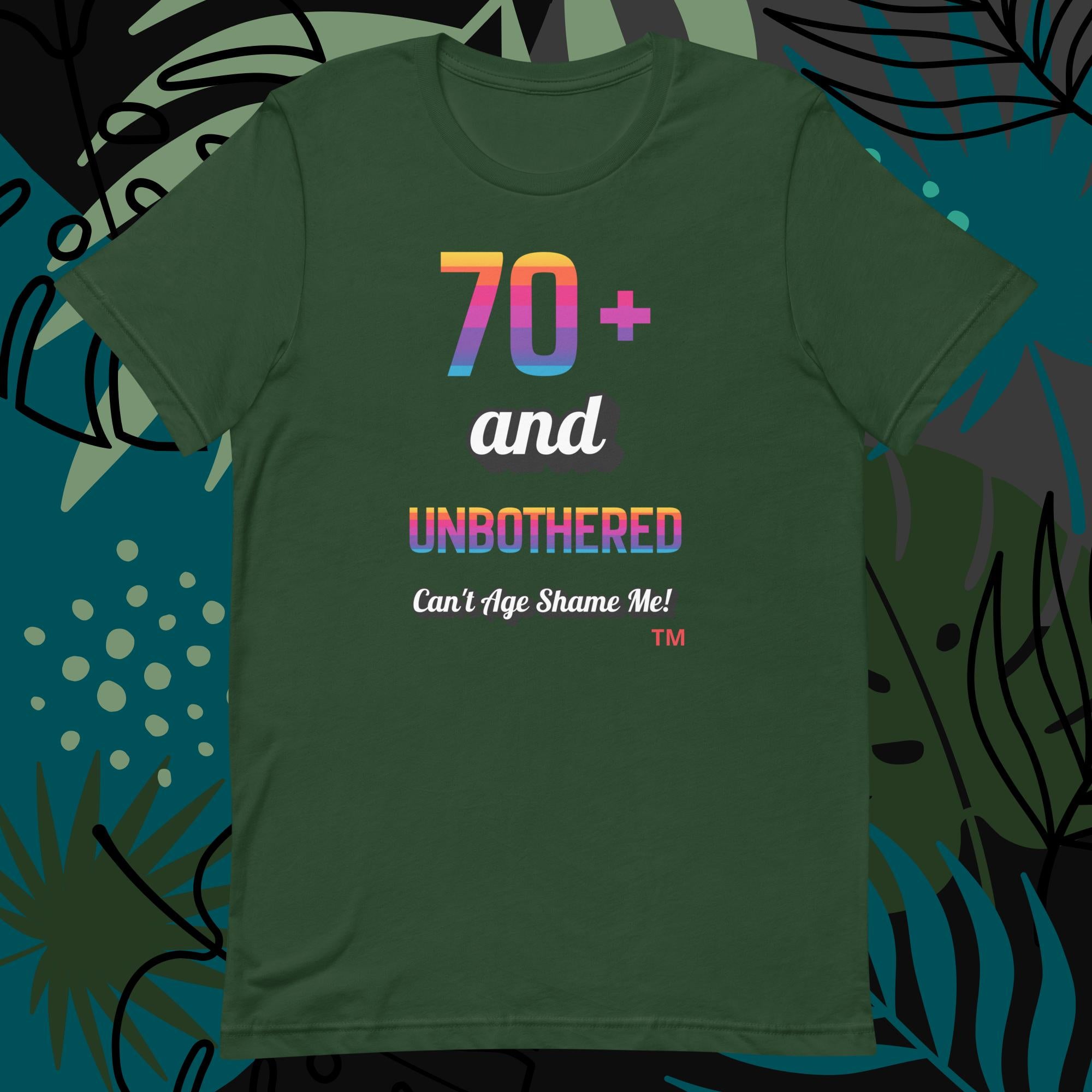 Green t-shirt with colorful text design on a decorative background
