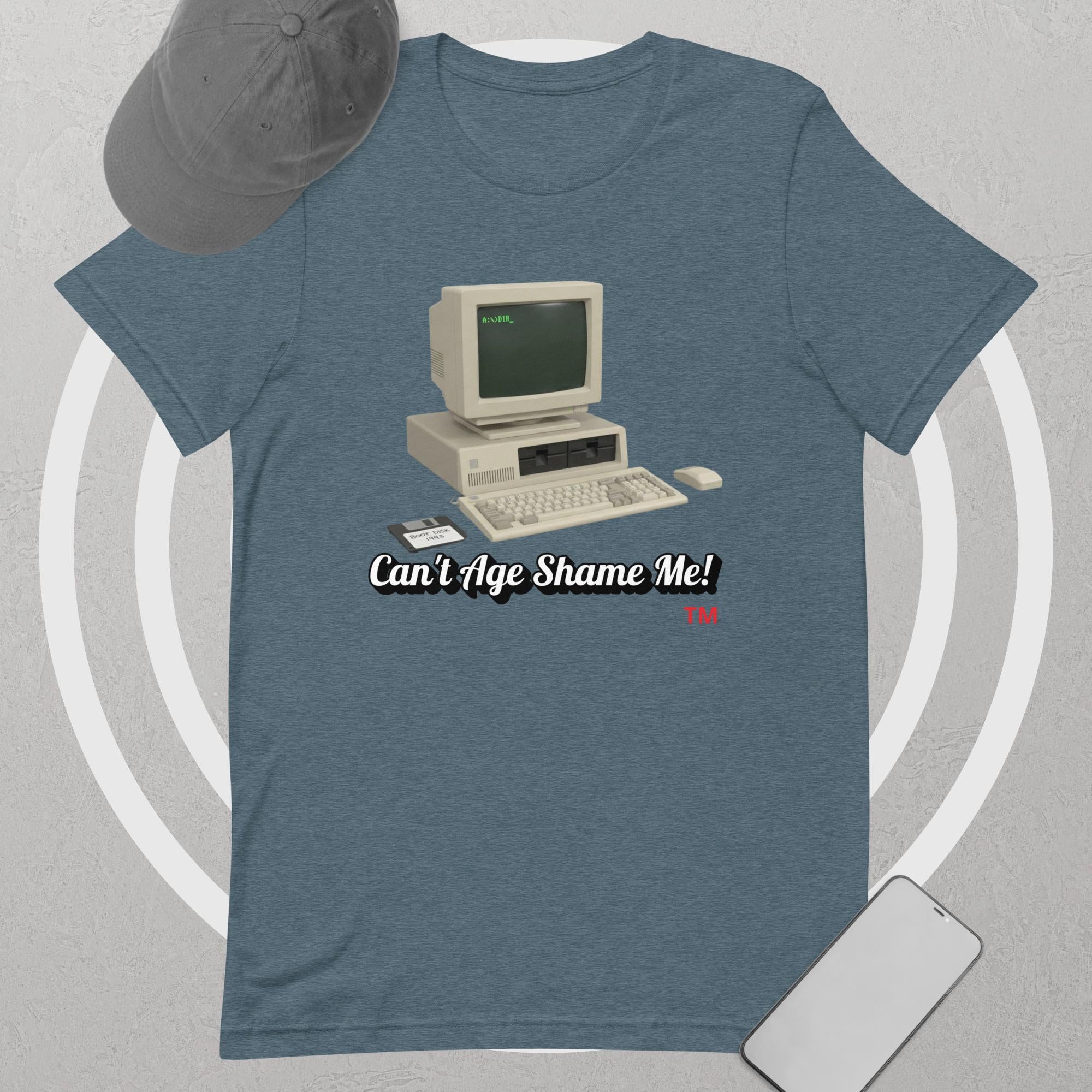 heather slate  t-shirt with vintage computer graphic and text 'Can't Age Shame Me!' on a gray background.
