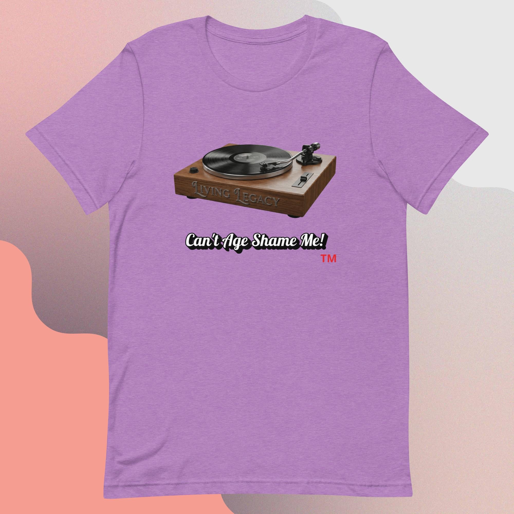 light purple t-shirt with a graphic of a turntable and text 'Can't Age Shame Me!' on a gradient background.