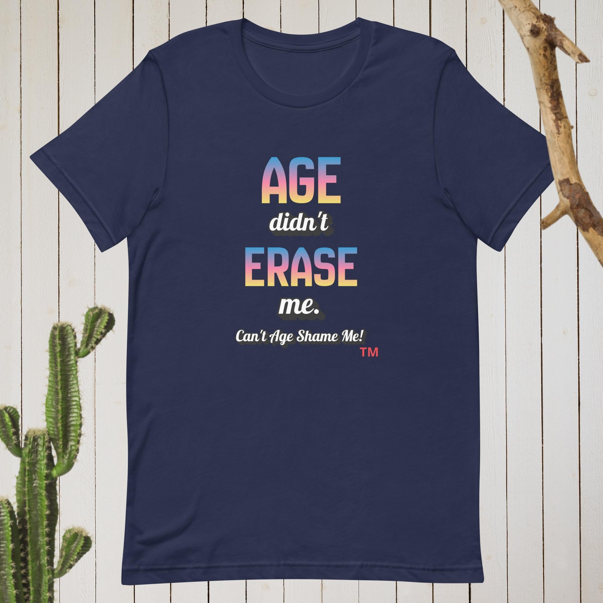 Navy blue t-shirt with colorful text on a wooden background