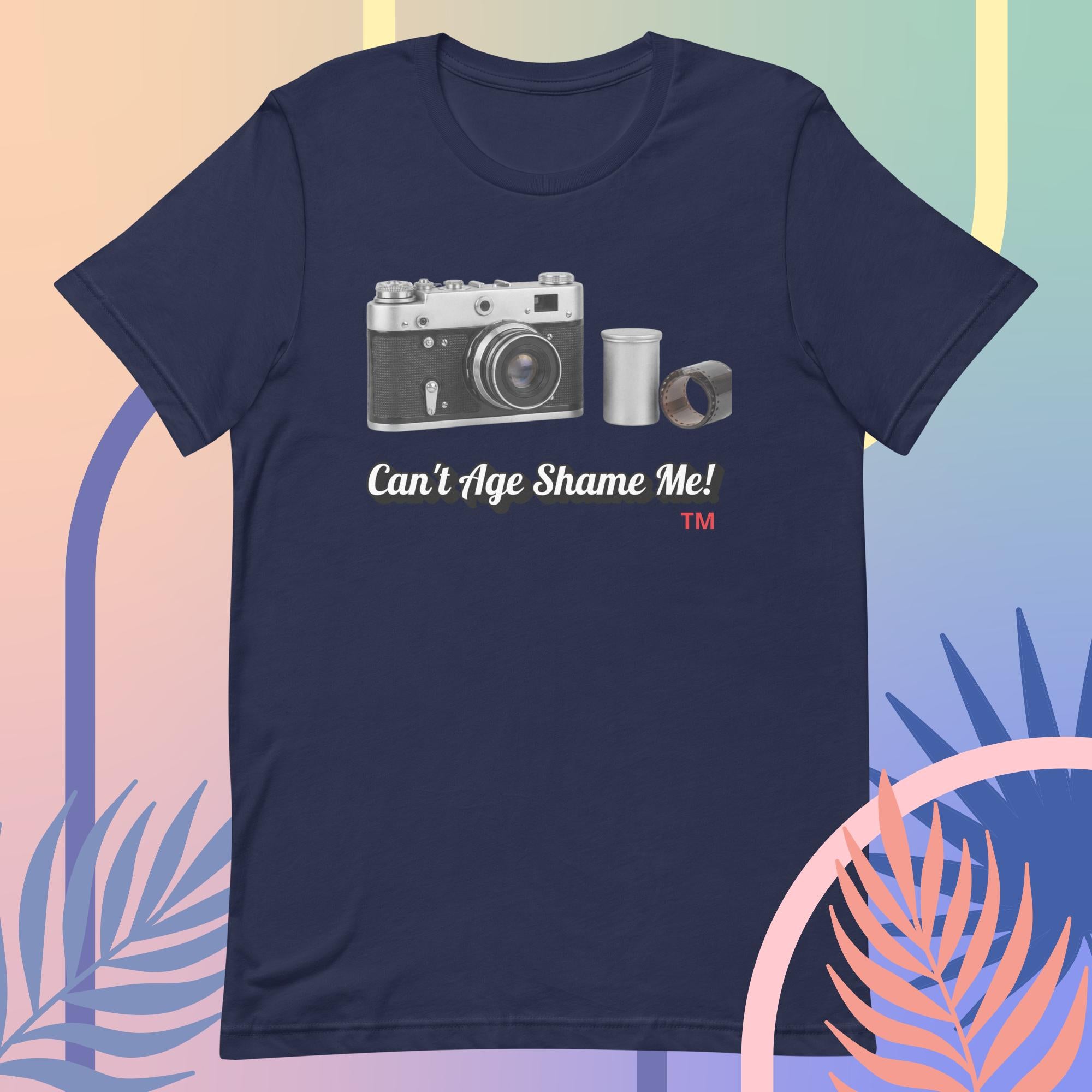 navy  t-shirt with a camera graphic and text  Can't Age Shame Me! on a colorful background