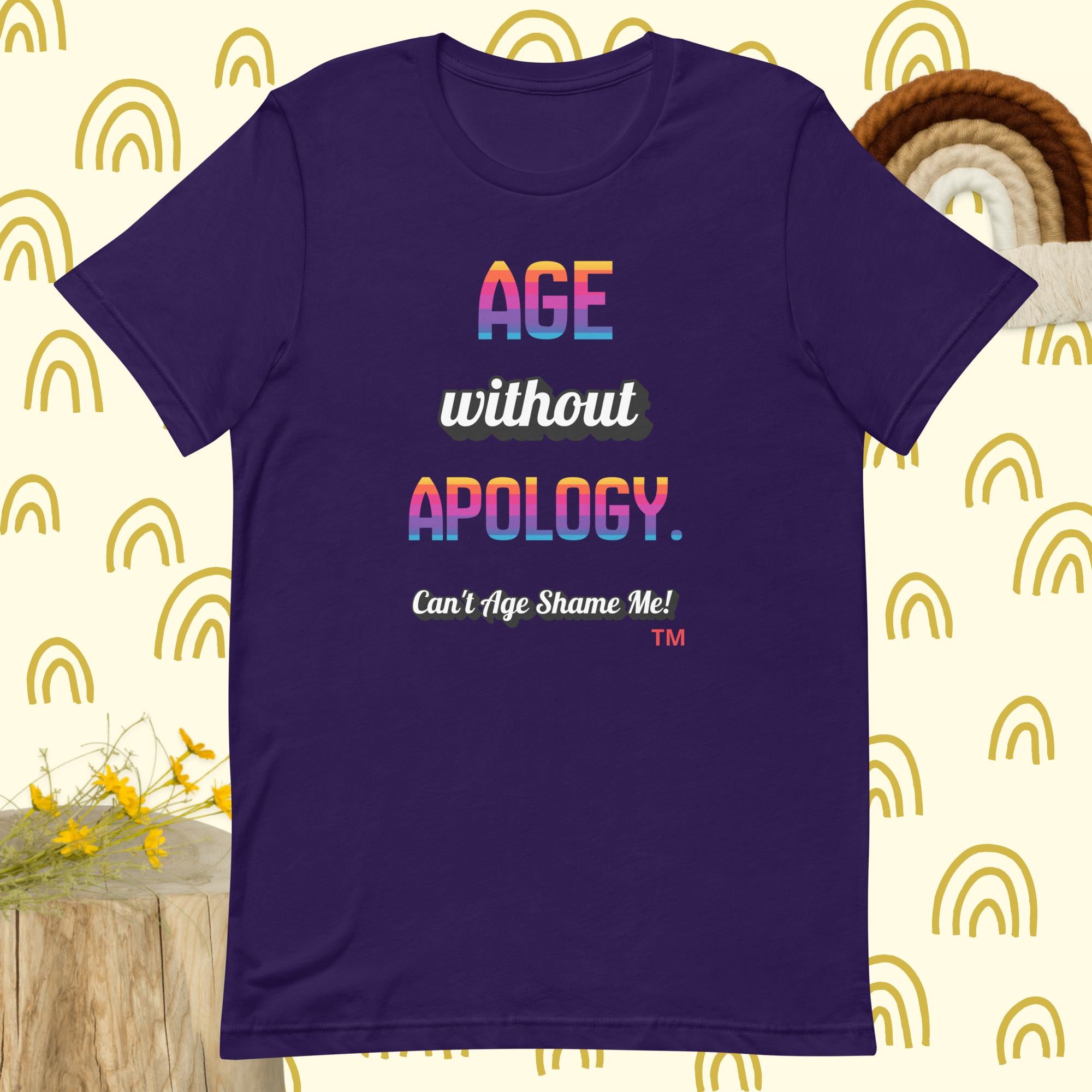Purple t-shirt with colorful text on a patterned background