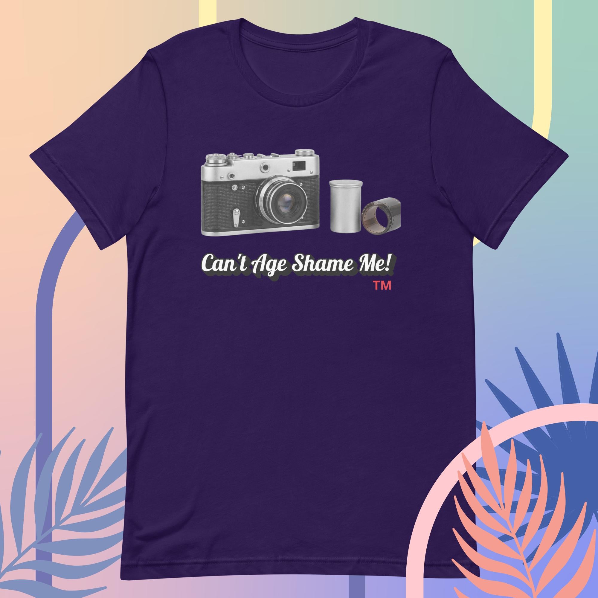 purple  t-shirt with a camera graphic and text  Can't Age Shame Me! on a colorful background