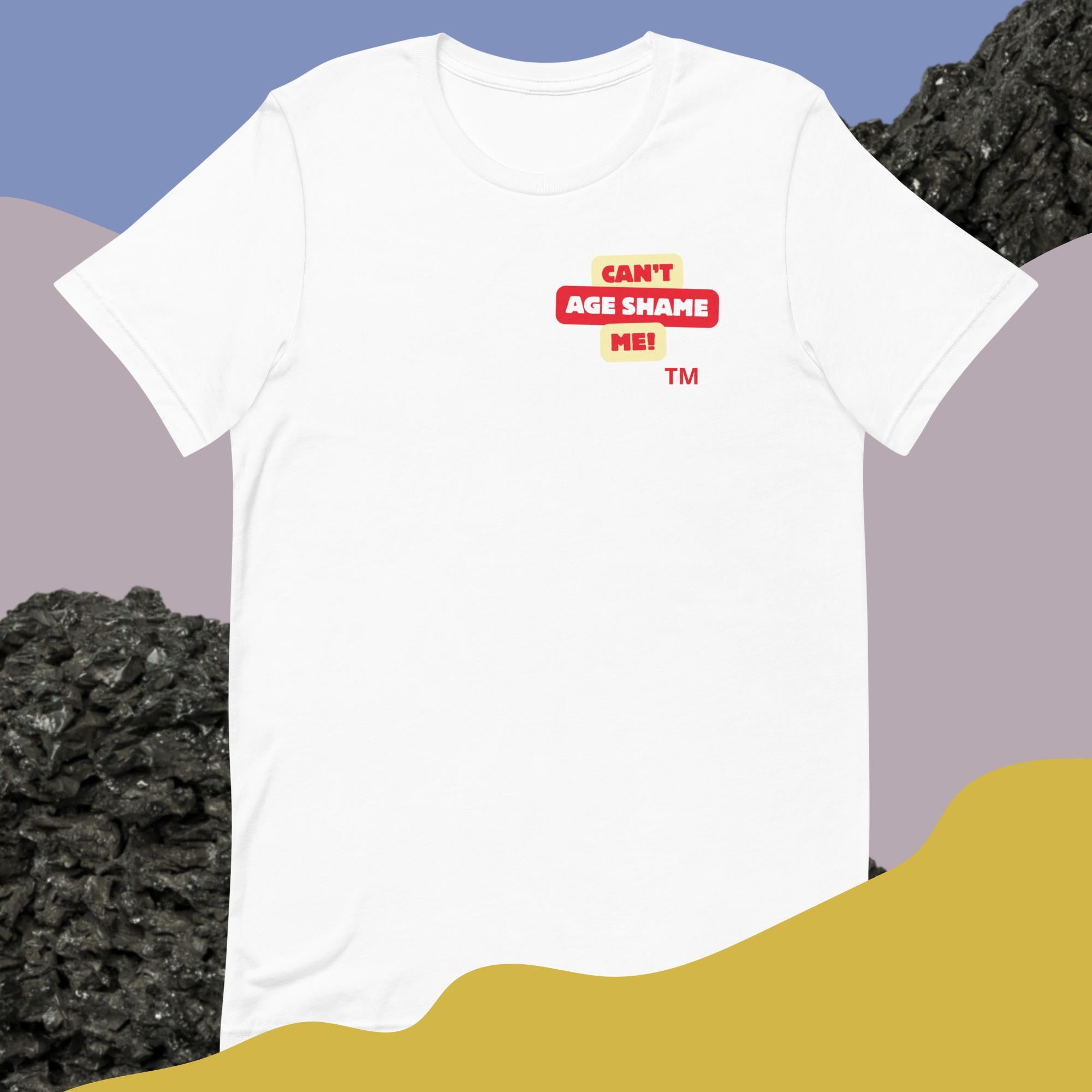 White t-shirt with a logo text graphic 'CAN'T AGE SHAME ME! design on a colorful abstract background