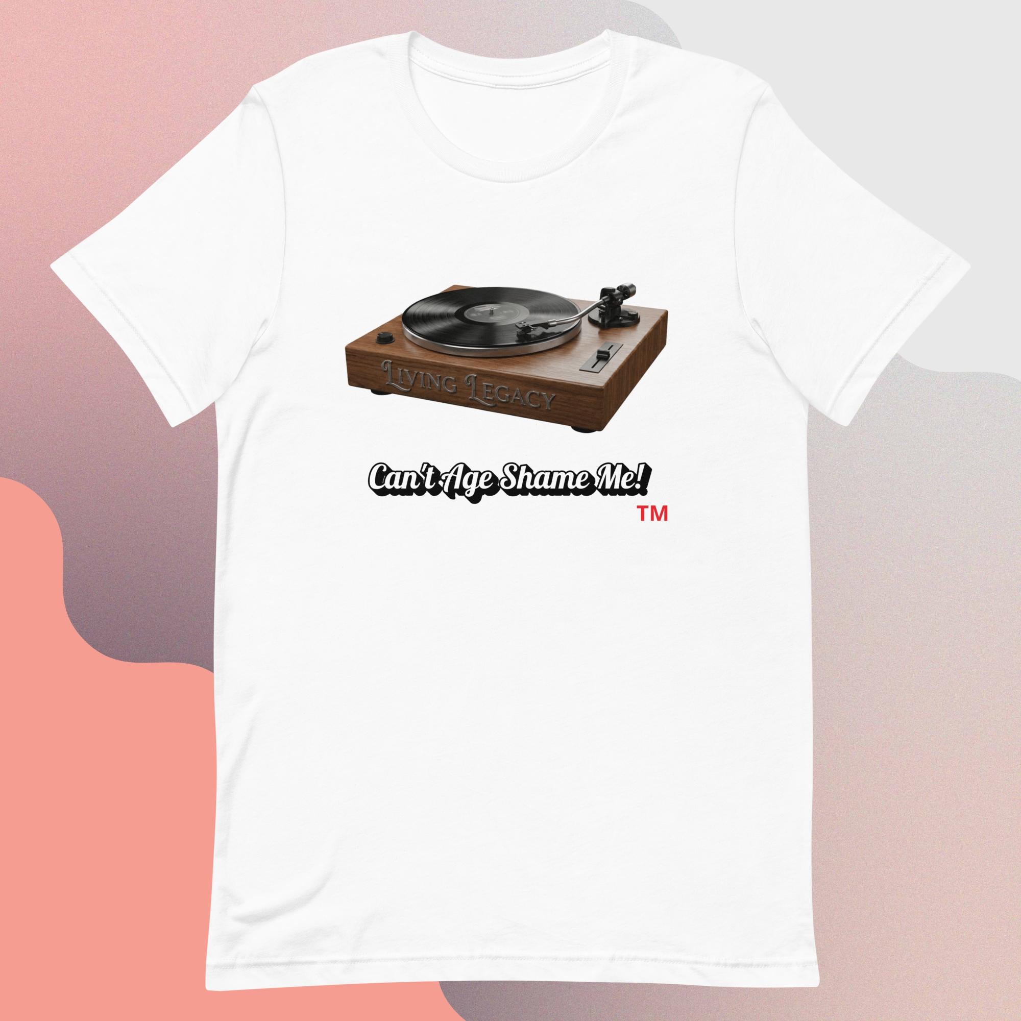 white t-shirt with a graphic of a turntable and text 'Can't Age Shame Me!' on a gradient background.