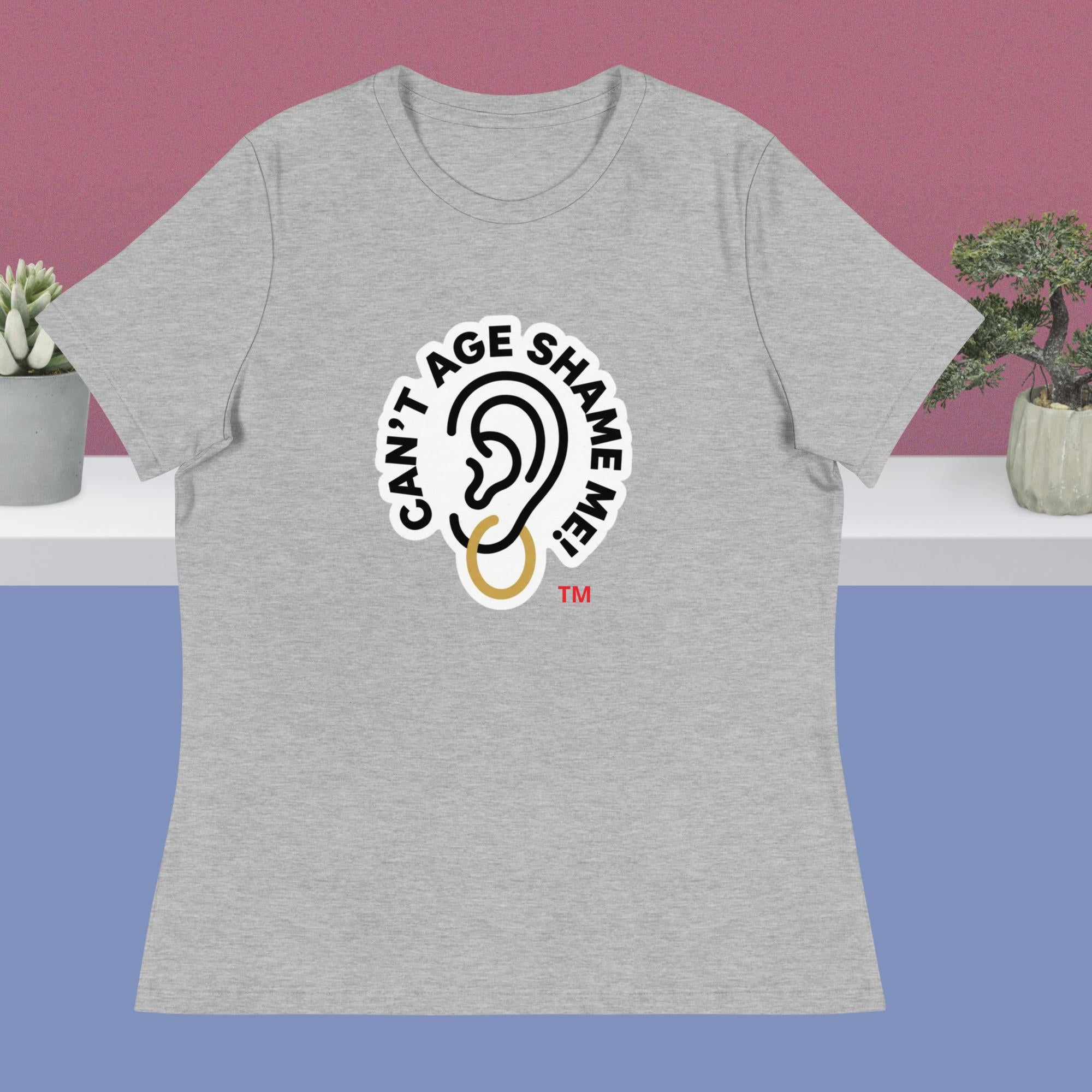 Light Gray t-shirt with 'Can't Age Shame Me' logo on a pink and blue gradient background