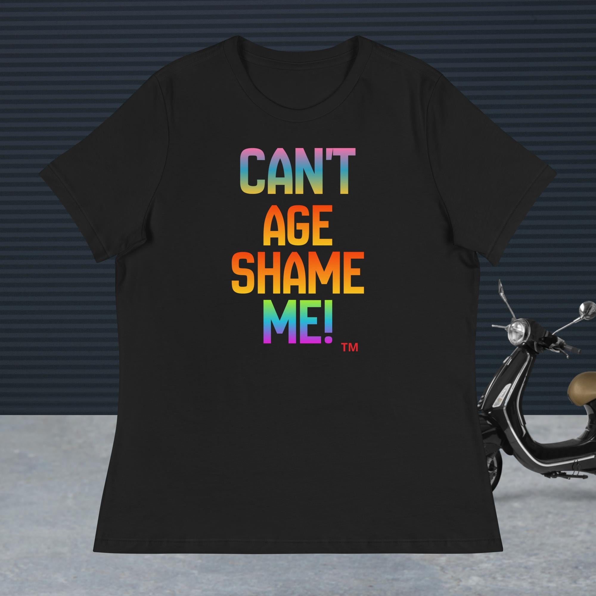 Black t-shirt with colorful text 'CAN'T AGE SHAME ME!' on a dark background