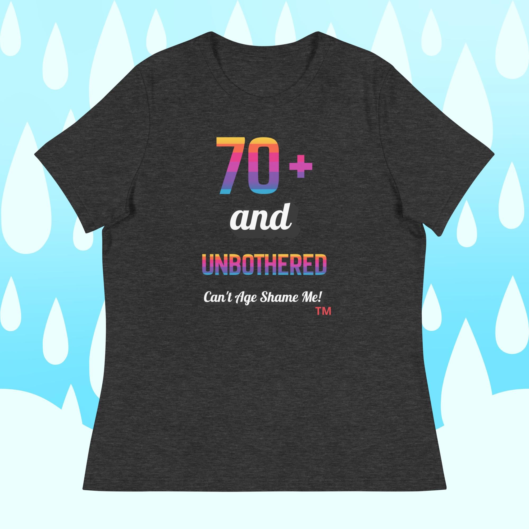 Dark gray t-shirt with colorful text on a light blue background with white shapes.