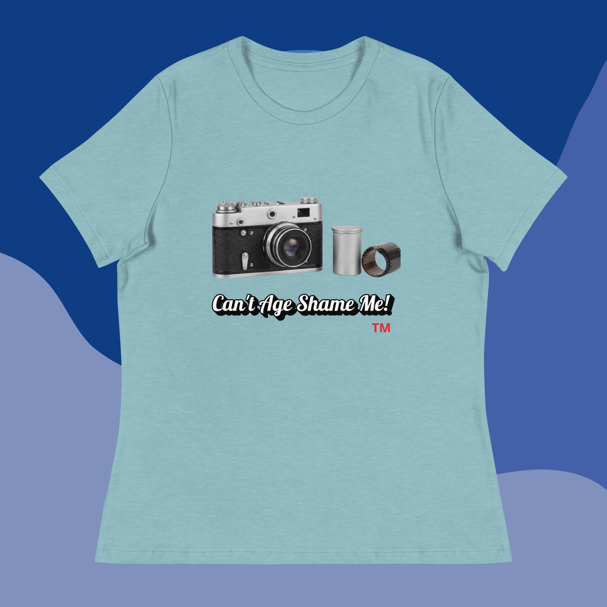 heather blue lagoon t-shirt with camera graphic and text 'Can't Age Shame Me!' on a blue background