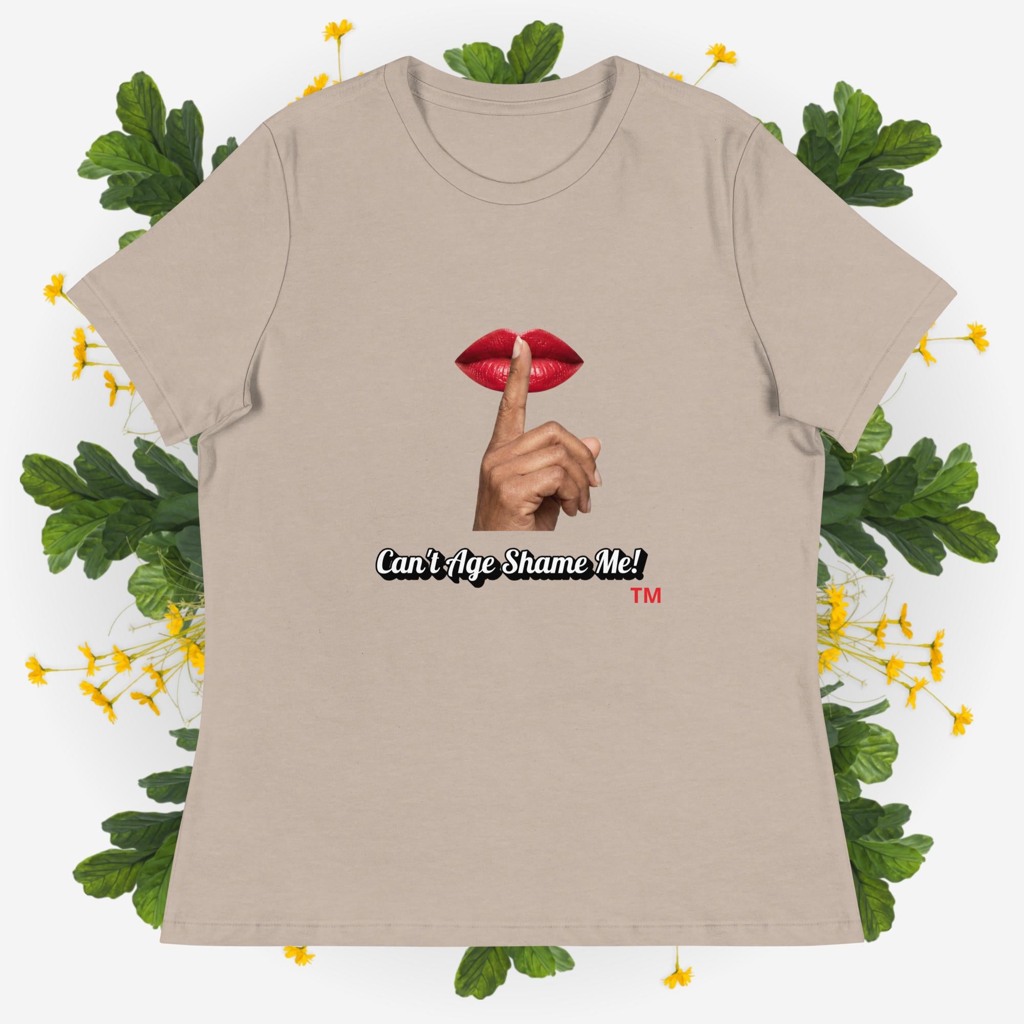 Heather Stone t-shirt with graphic design and text 'Can't Age Shame Me' on a decorative background with leaves and flowers.