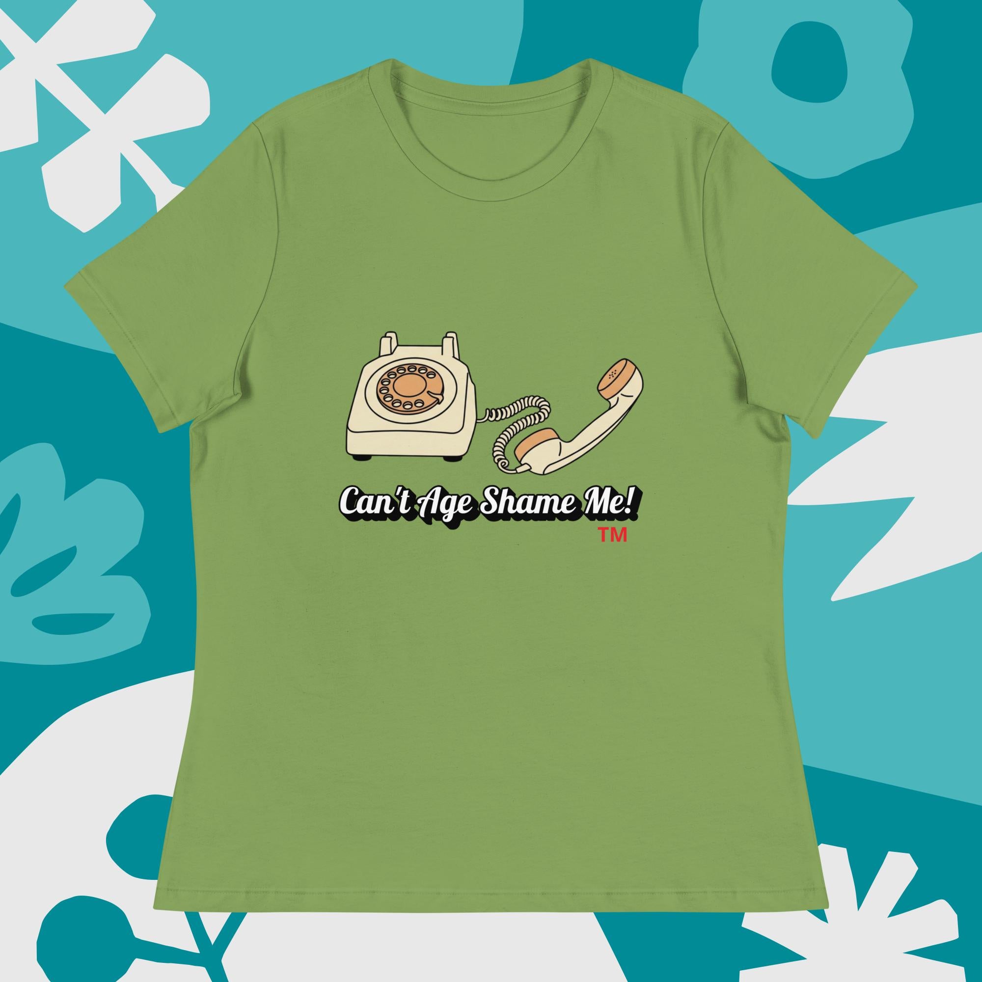 leaf  t-shirt with a vintage telephone graphic and text  can't age shame me on a blue and white abstract background