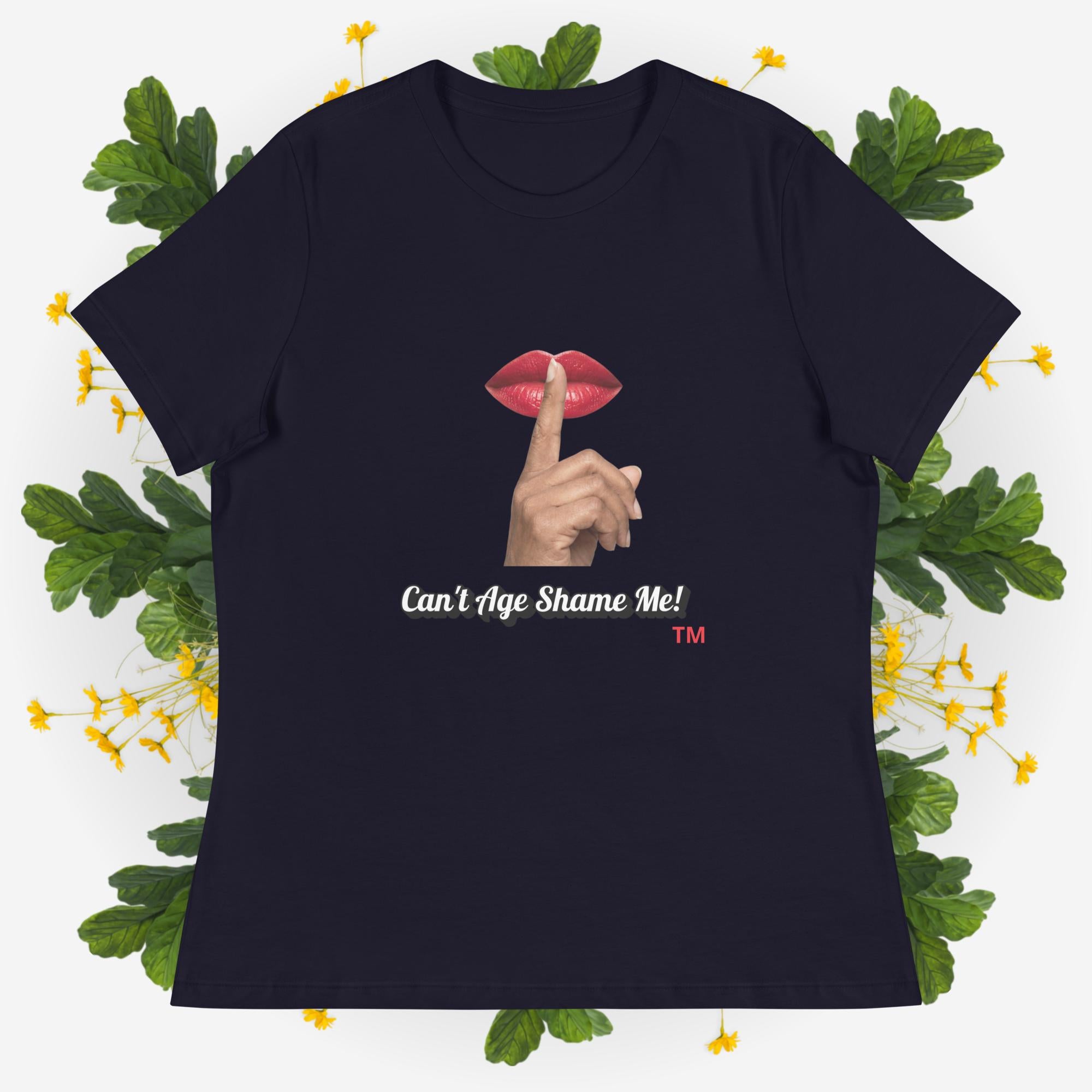 Navy  t-shirt with graphic design and text 'Can't Age Shame Me' on a decorative background with leaves and flowers.