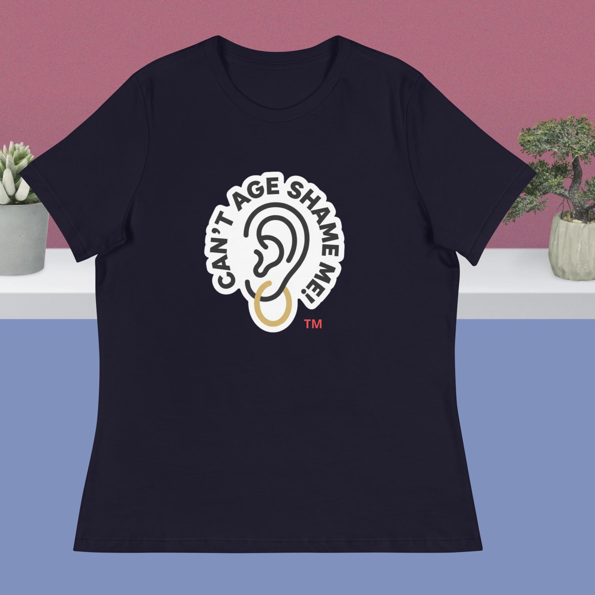 Navy t-shirt with 'Can't Age Shame Me' graphic on a blue and pink gradient background
