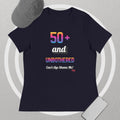 Navy  t-shirt with colorful text design on a gray background