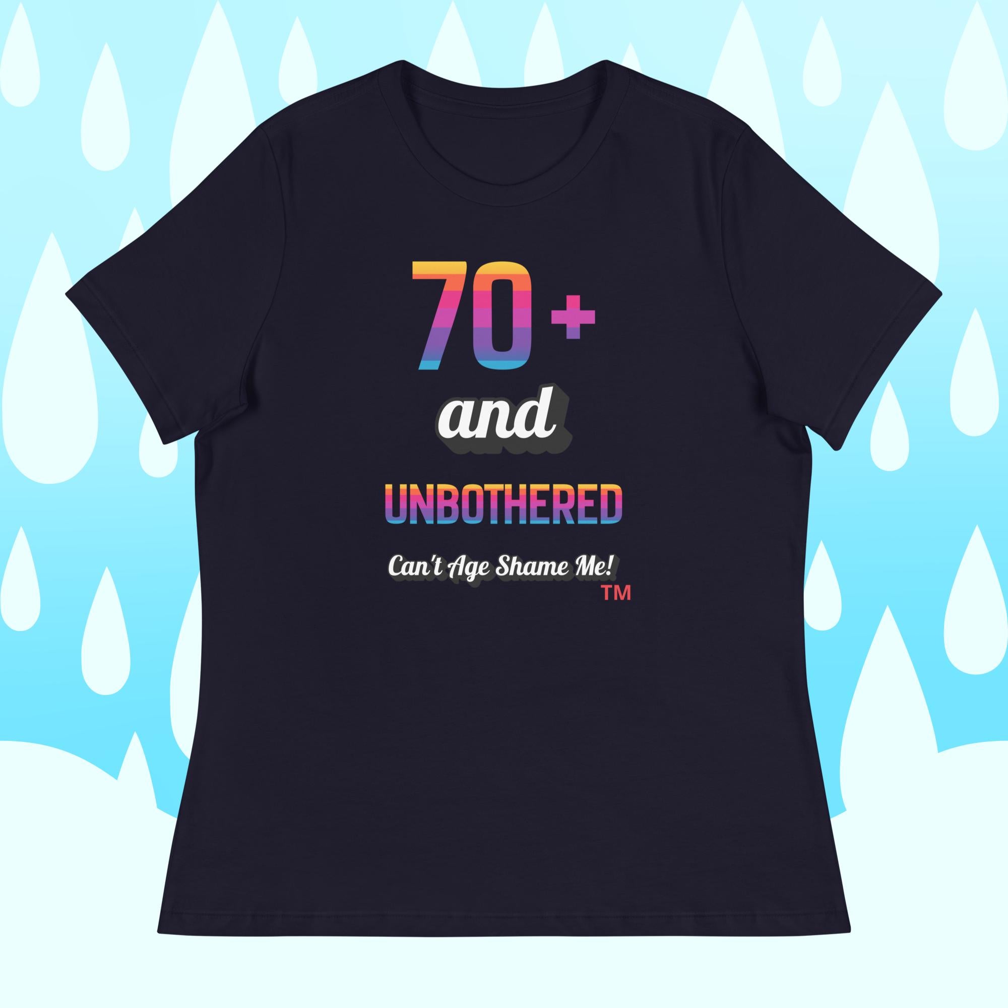 Navy t-shirt with colorful text design on a light blue background with white shapes.