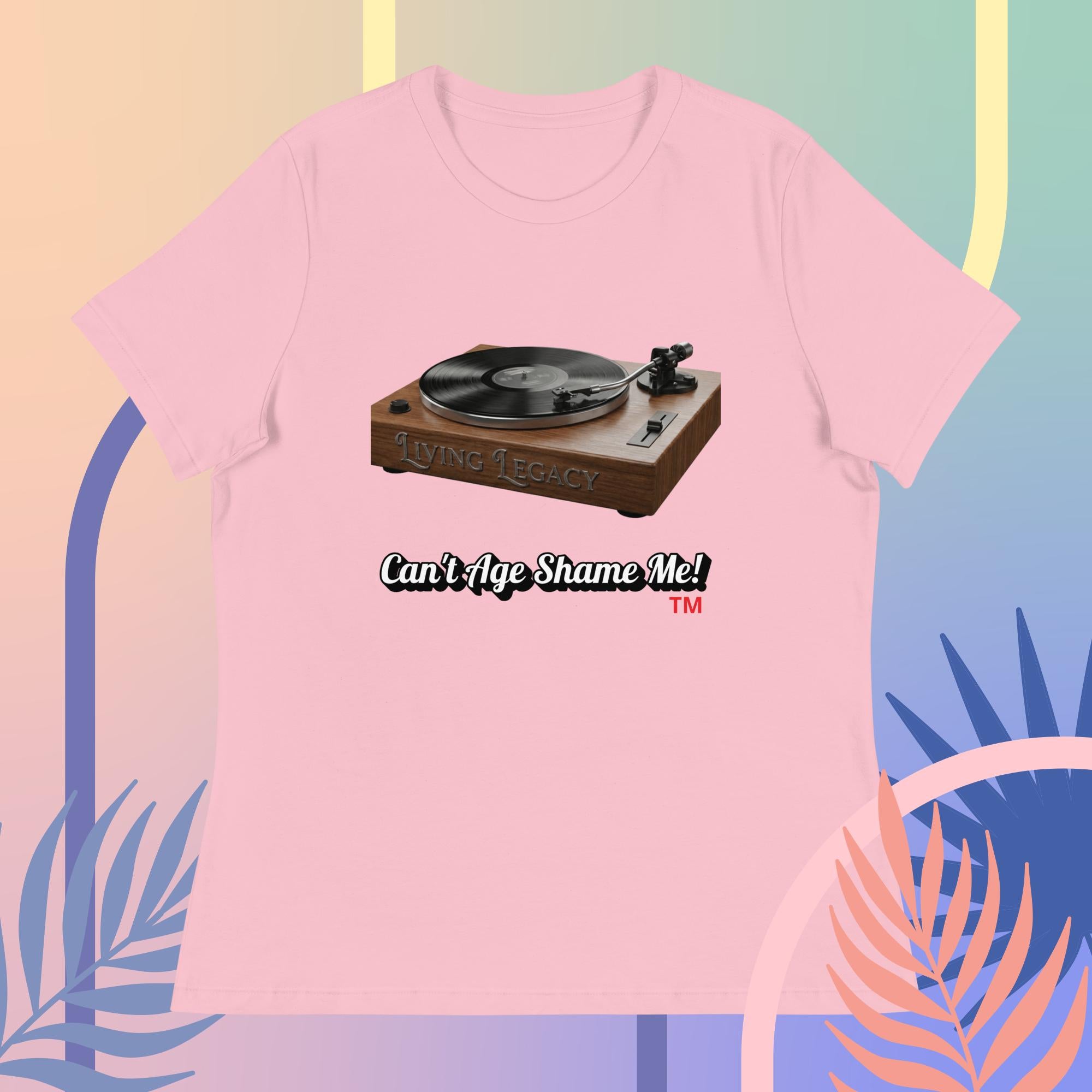 pink t-shirt with a graphic of a turntable and text 'Can't Age Shame Me!' on a colorful abstract background.