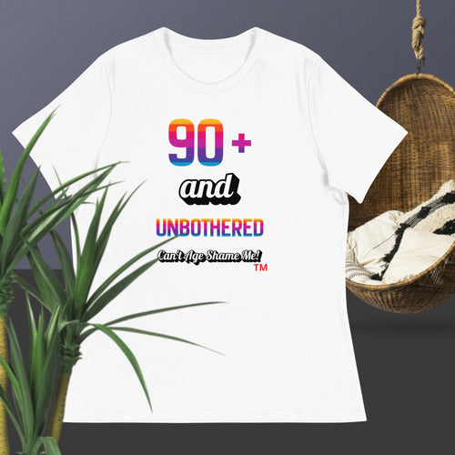 White t-shirt with colorful text design on a dark background